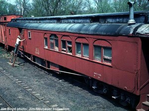 Rock Island 1094; June 1969; Jim Neubauer scraping paint; Jim Boyd photo, Jim Neubauer collection