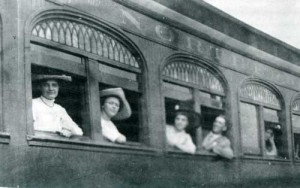 Passengers looking out passenger car windows